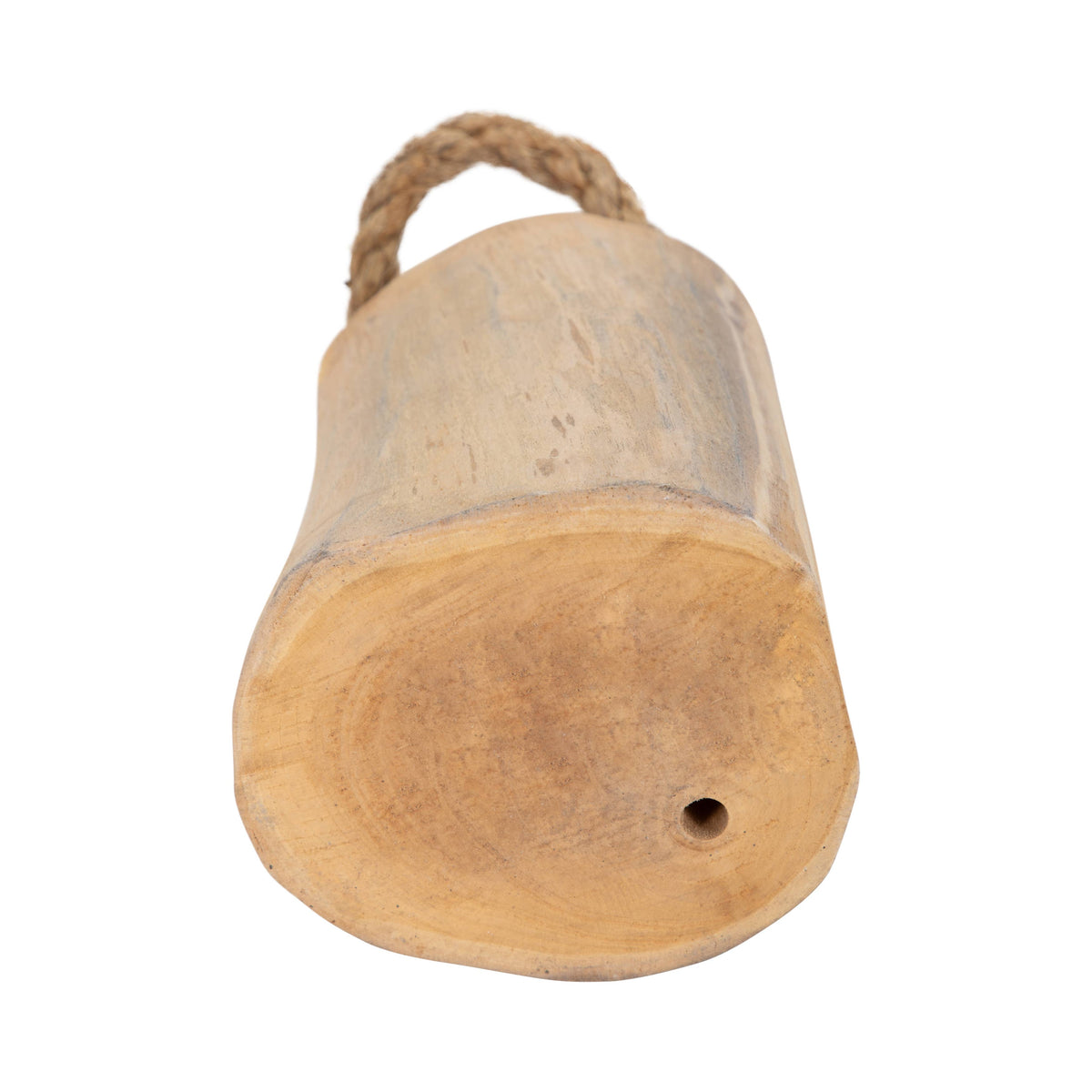 Wooden cylindrical object with a rope handle on a white background