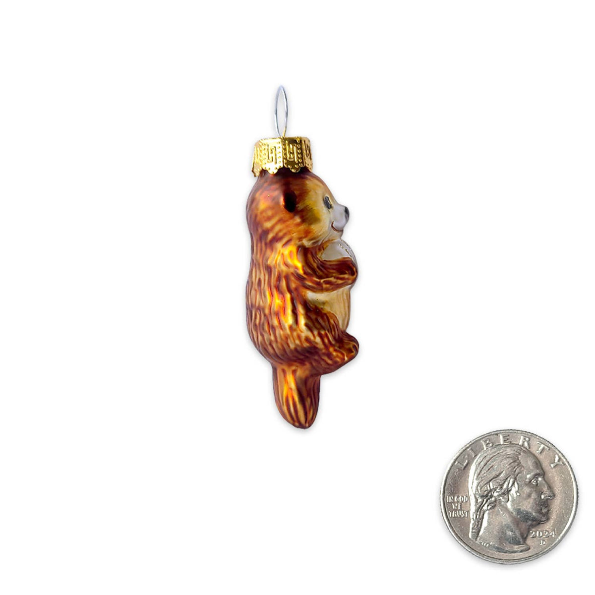 A small glass ornament shaped like a bear, shown on a white background with a U.S.