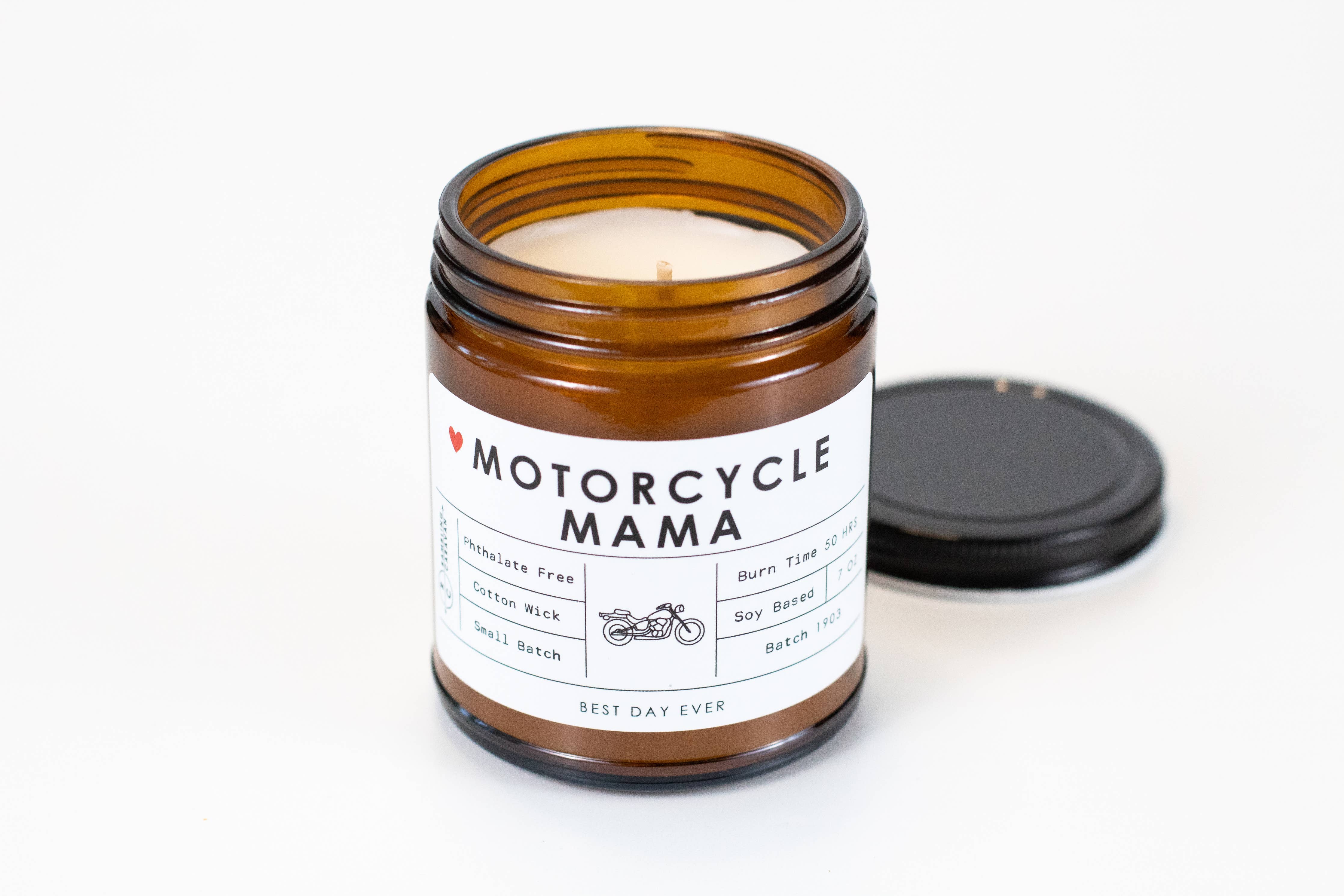 Candle in a brown jar labeled 'Motorcycle Mama' on a white background
