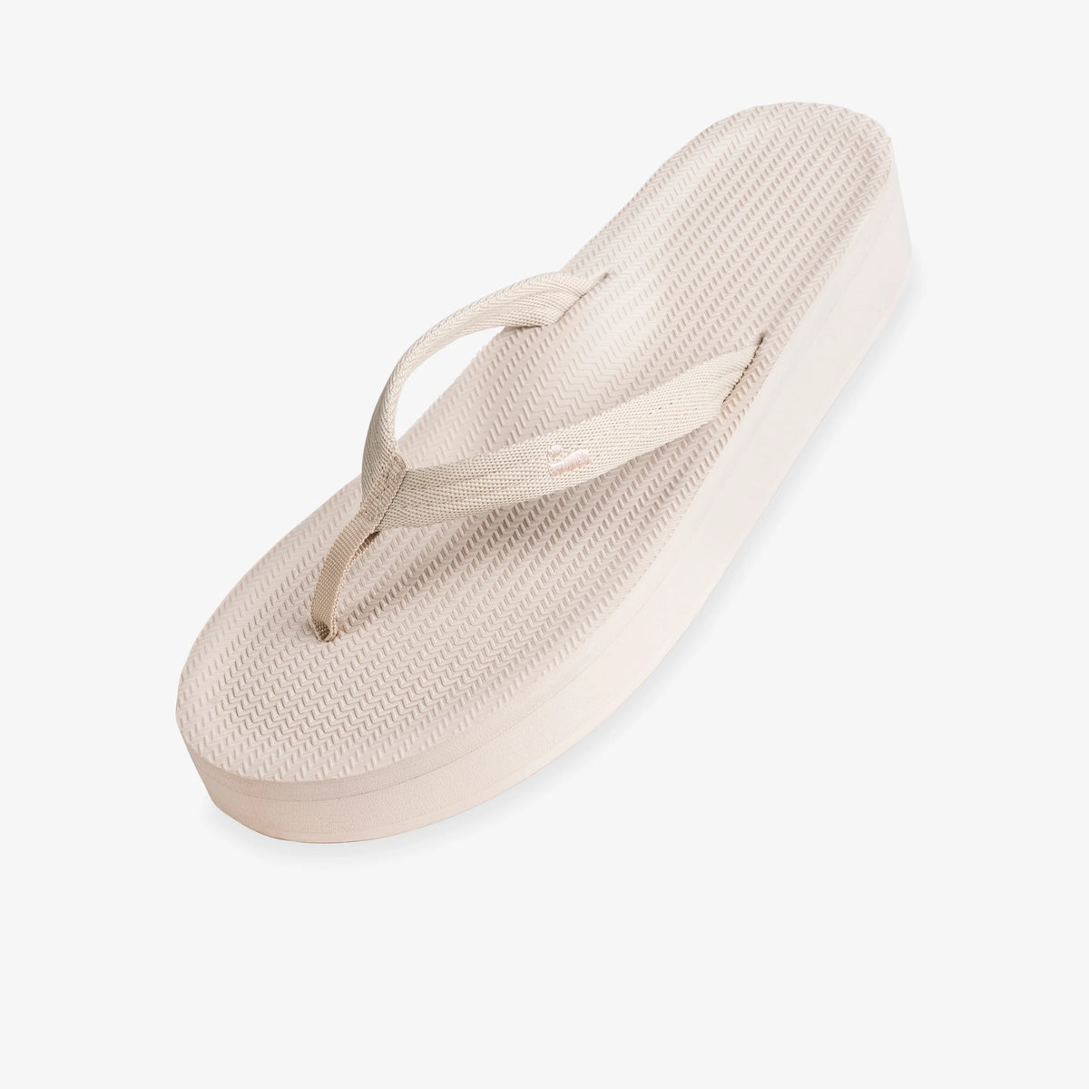 Beige flip-flop sandal on a white background