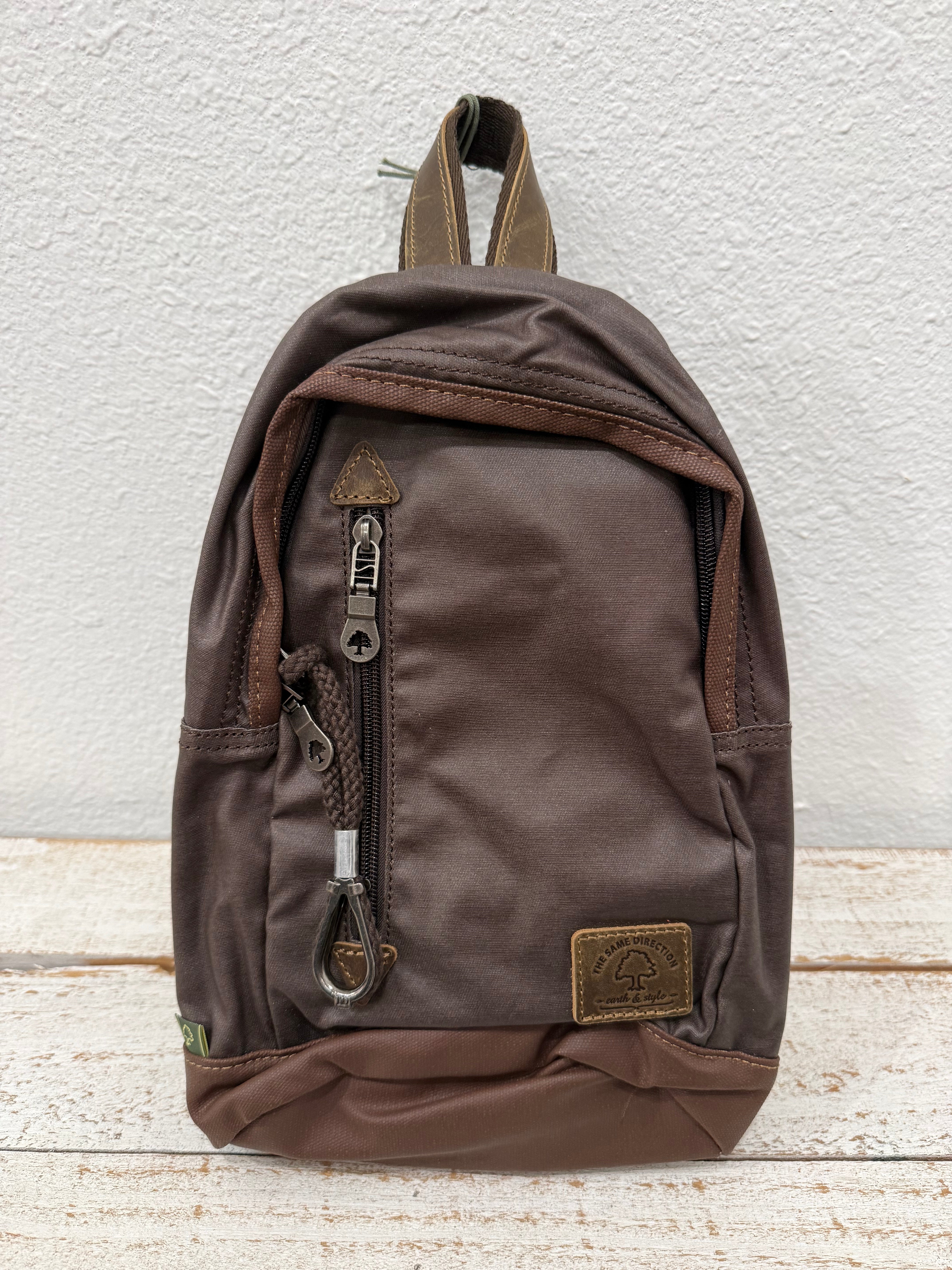TSD BRAND URBAN LIGHT COATED CANVAS SLING BAG - BROWN