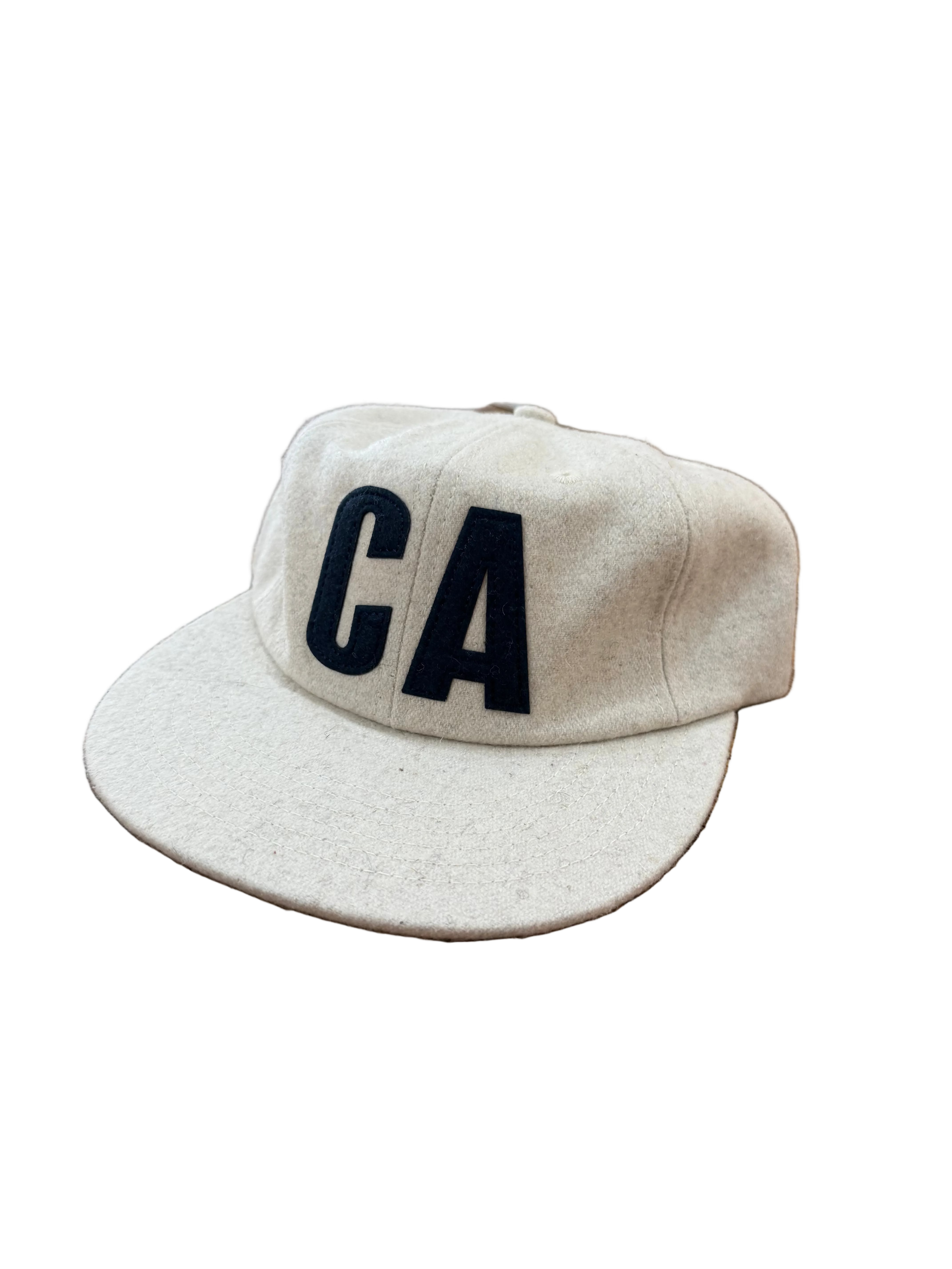 cream wool flat bill hat with navy blue CA logo