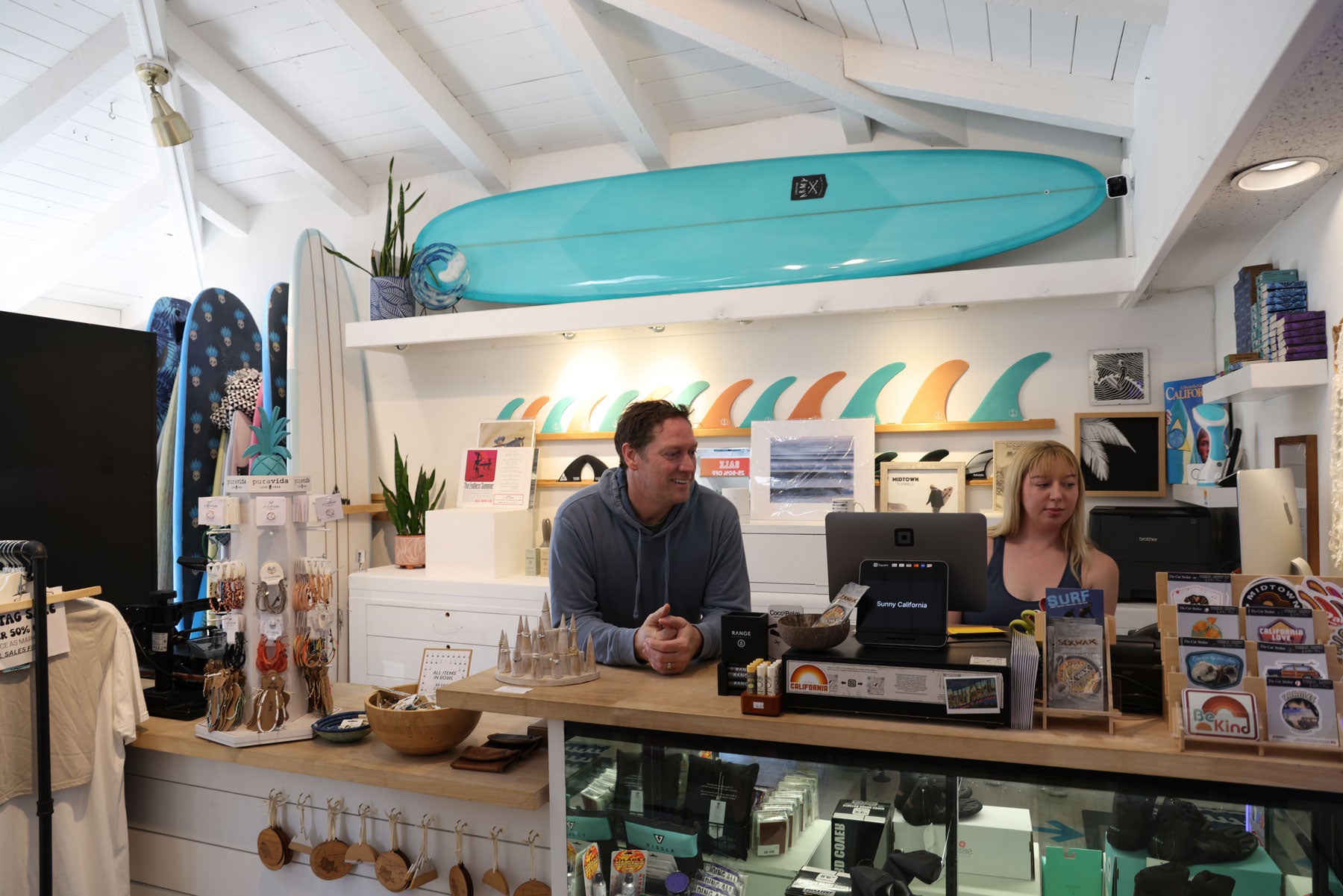 Staff at the Sunny California Surf Shop in Carmel California