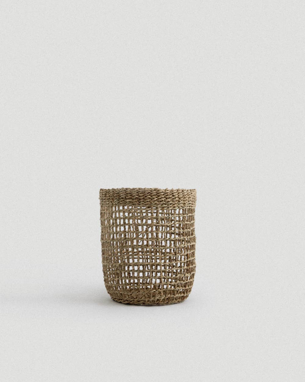 Woven basket on a light gray background