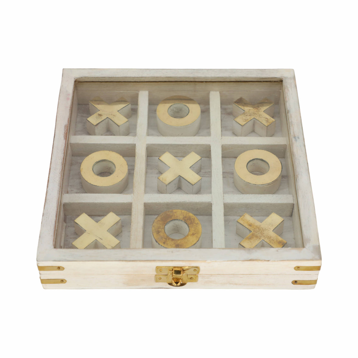 Wooden tic-tac-toe game set with gold pieces on a white background