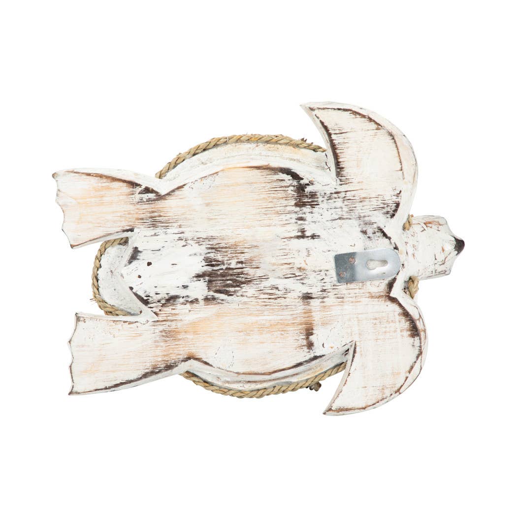 A distressed wooden bird-shaped ornament or wall decor piece with a white and brown weathered finish, a natural rope border, and a metal hanger on the side, shown against a plain white background.