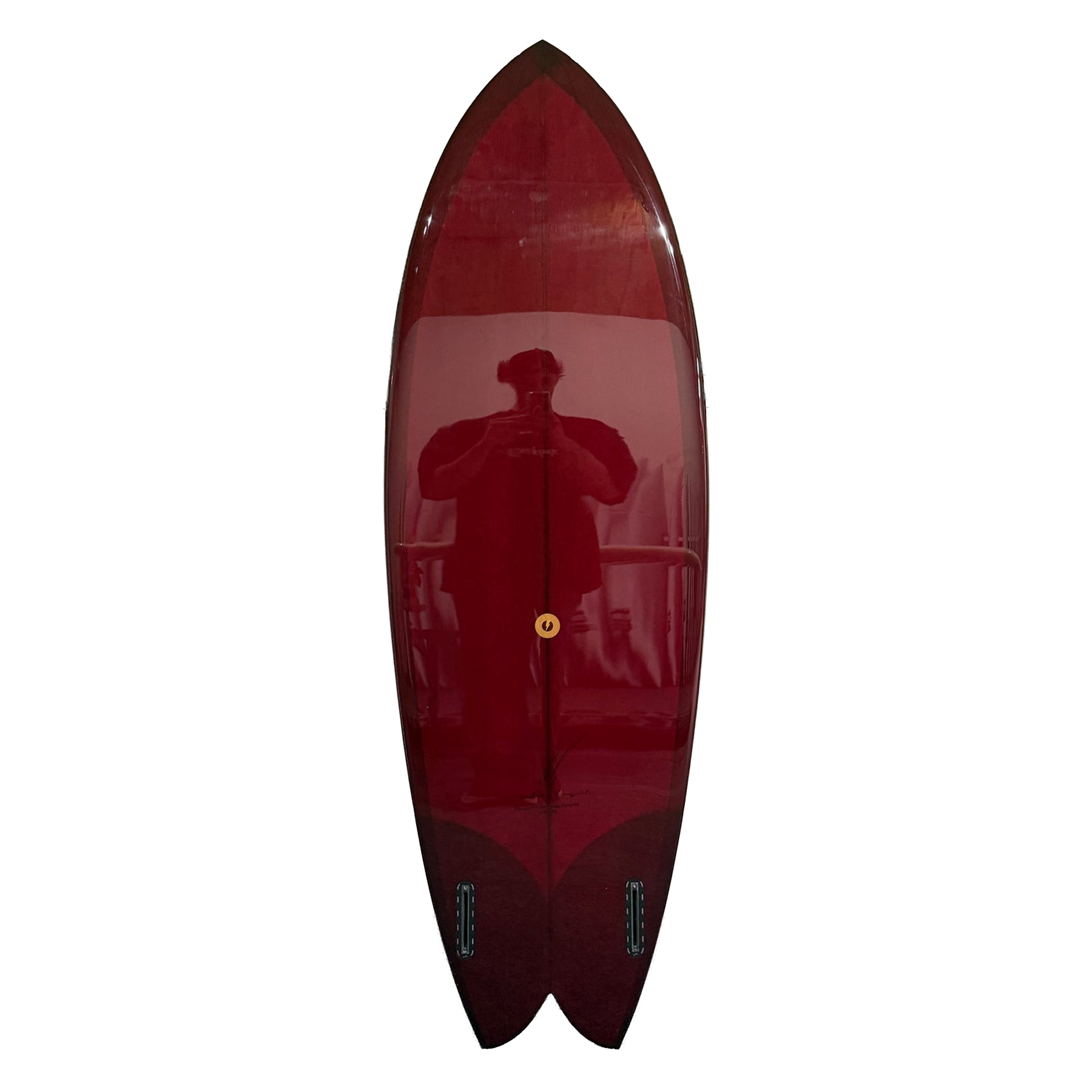 Red surfboard with a person's reflection on a white background
