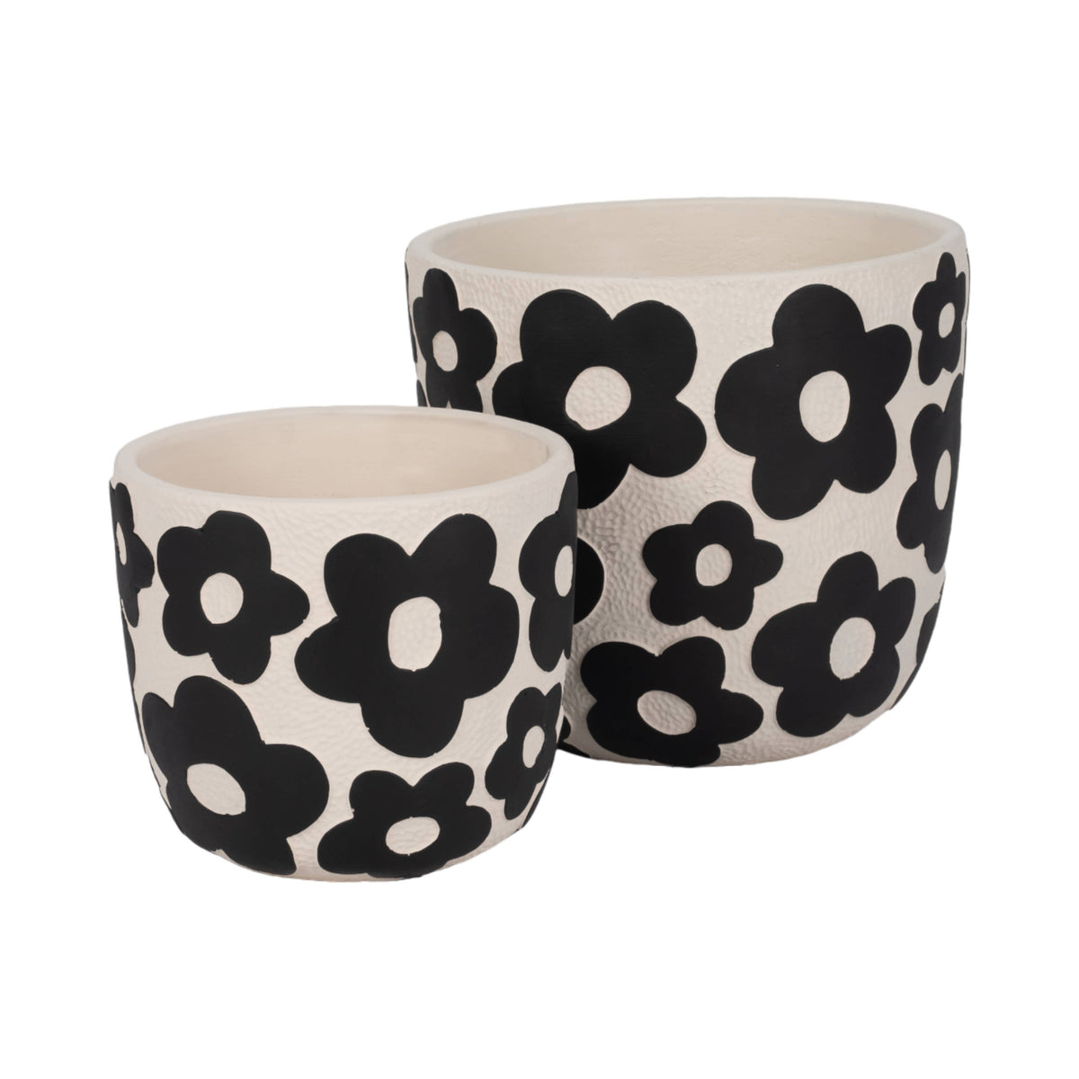 Two ceramic planters in different sizes, featuring a bold black daisy pattern on a warm cream background, set against a plain white studio backdrop.