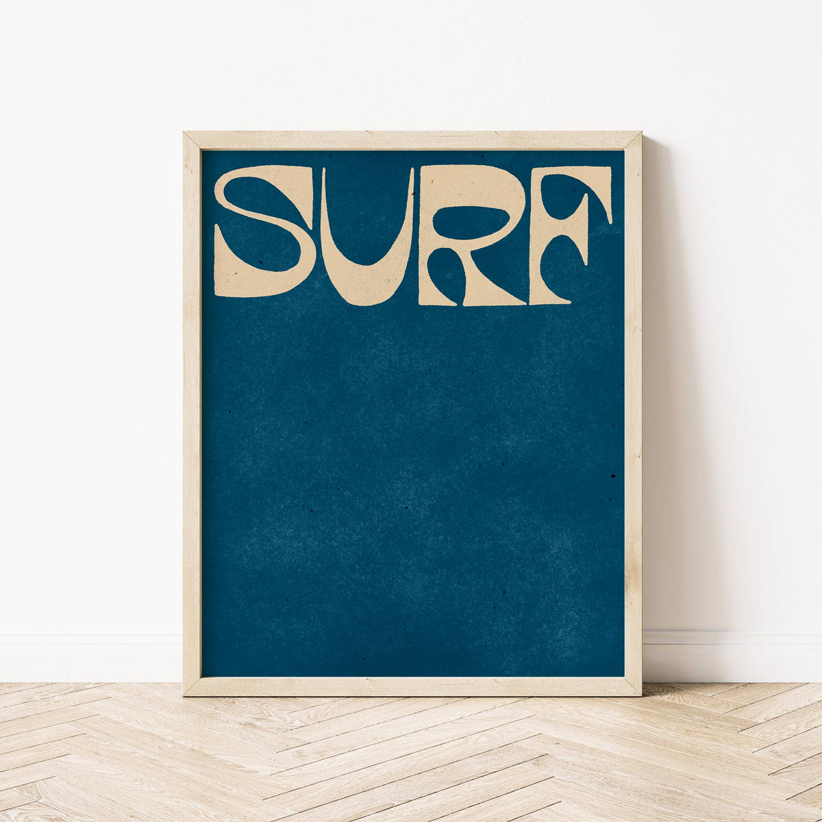 Framed artwork with 'SURF' text on a blue background