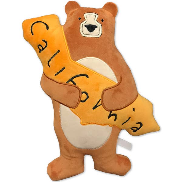 A plush bear toy holding a large yellow sign that says 'California' in black script, shown on a plain white background.