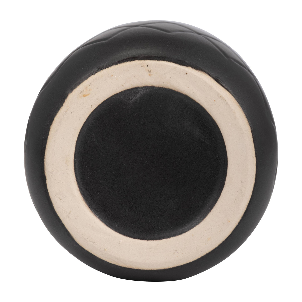 Round black object with a white interior on a white background