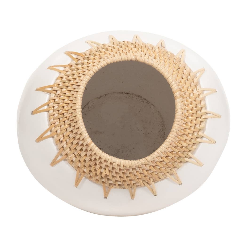 Round decorative item with woven beige center and white border on a white background
