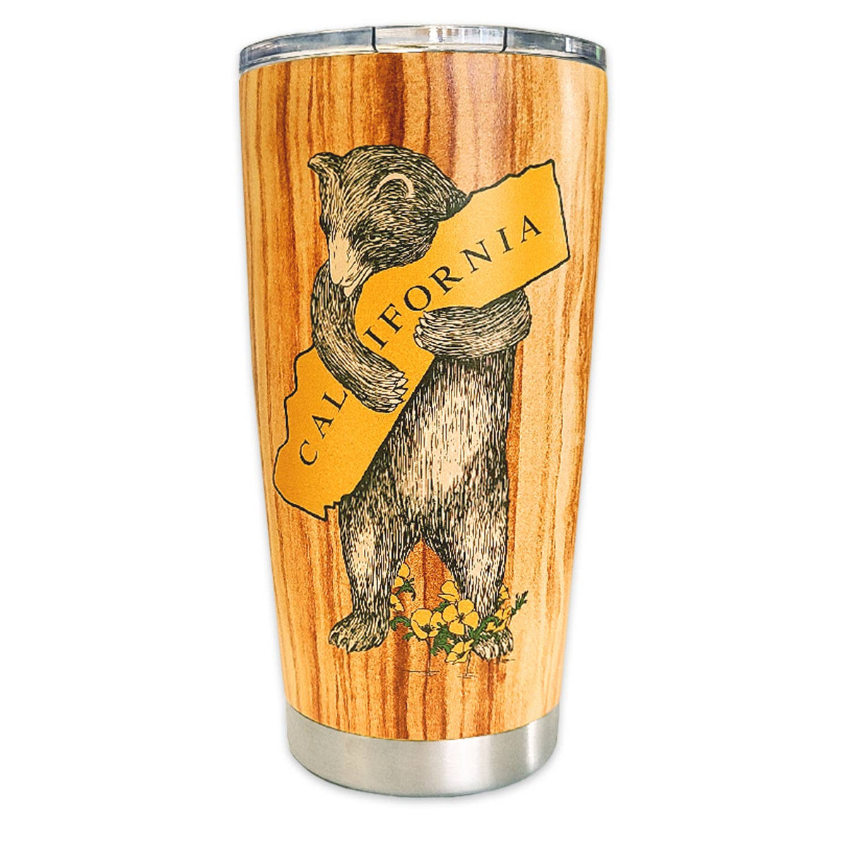 A stainless steel travel tumbler with a wood-grain finish, featuring an illustration of a bear holding a yellow banner that reads 'CALIFORNIA'.