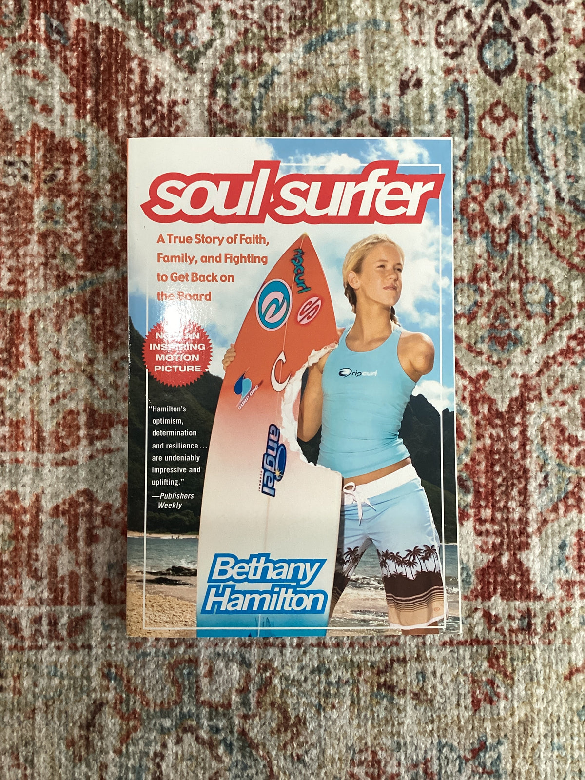 Book titled 'Body Surfer' by Bethany Hamilton on a textured surface