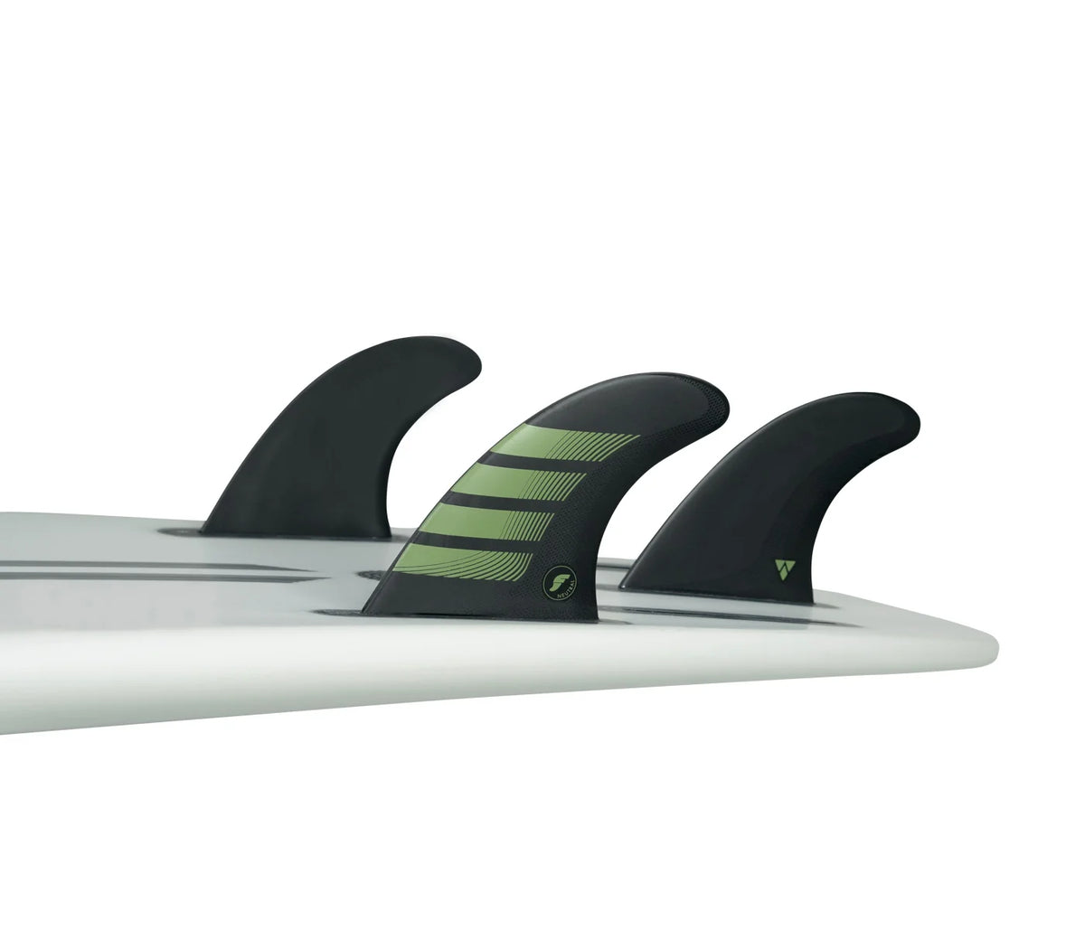 Close-up of a surfboard with F8 Alpha Thruster-Carbon/Olive fins on a white background