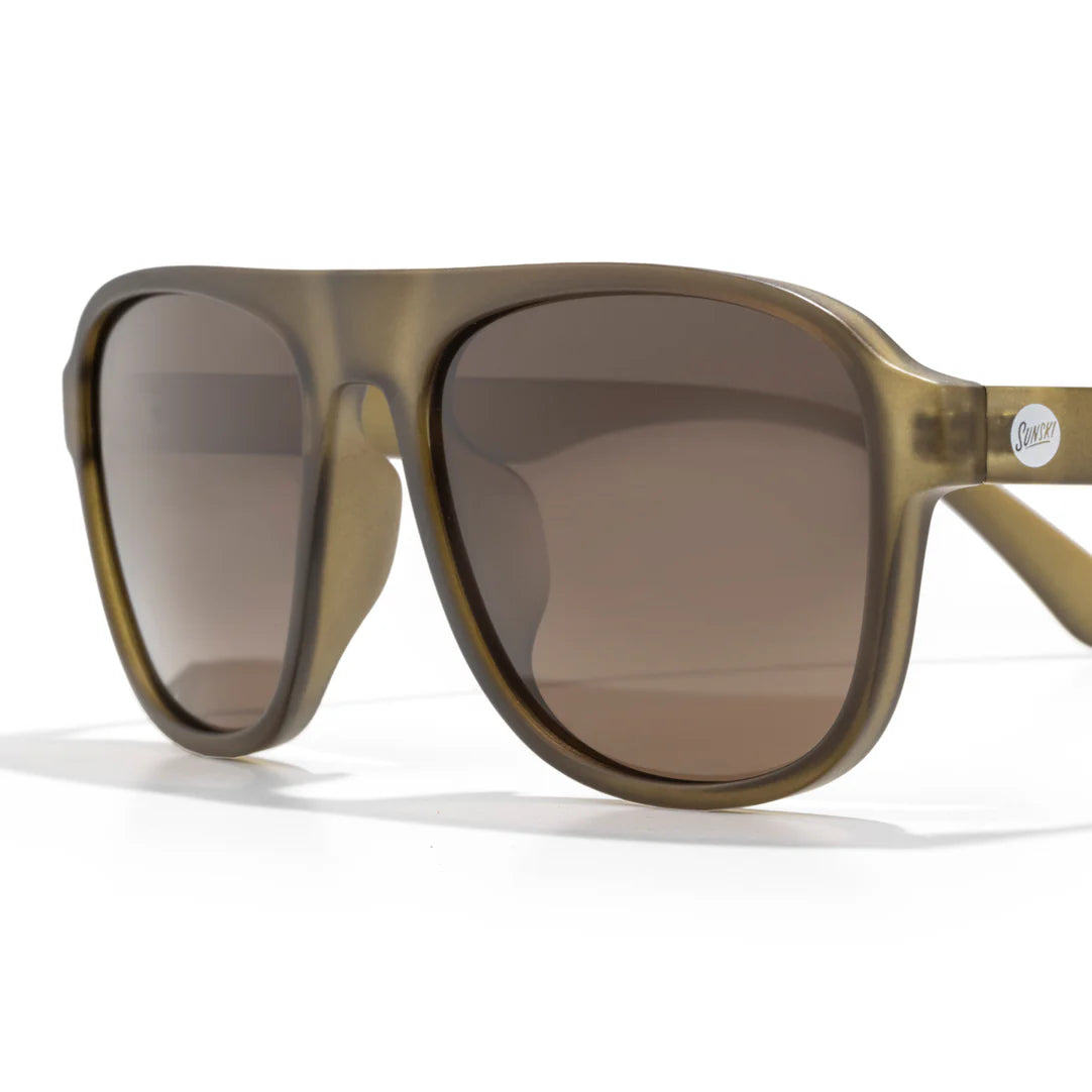 Close up of Sunski Shoreline Polarized Sunglasses in Olive Amber in Olive Amber