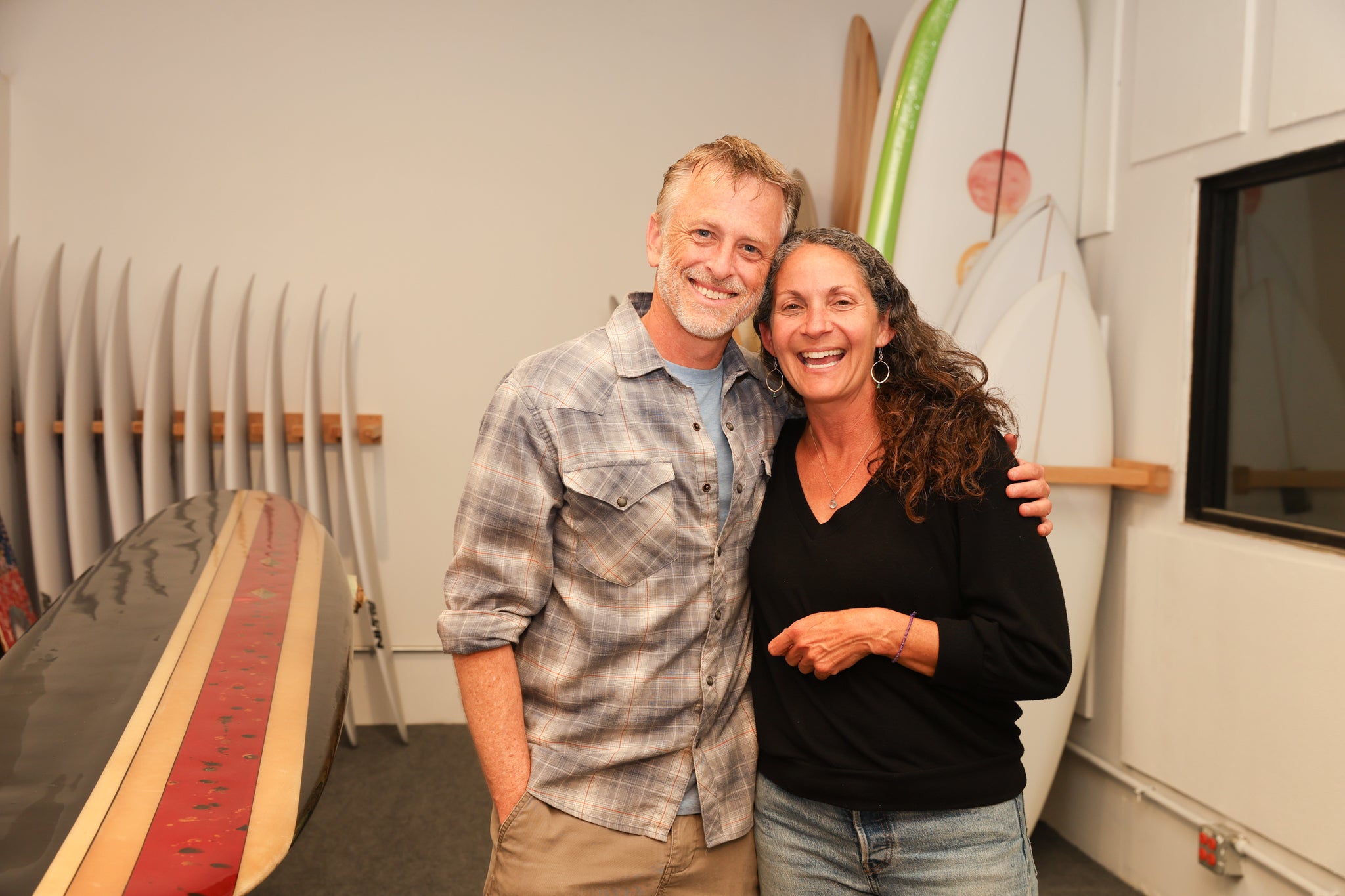 Two friends hanging out in the Sunny California board room