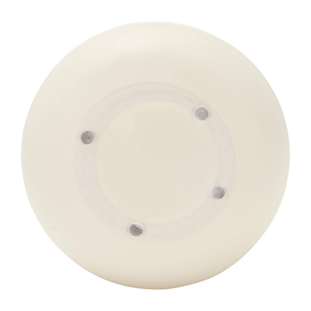 Round white object with gray buttons on a white background