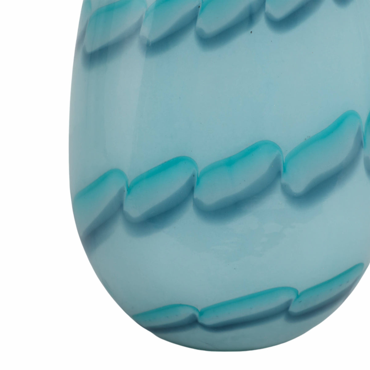 Close-up of a blue textured object on a white background